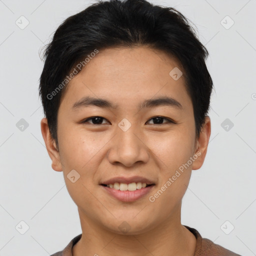 Joyful asian young-adult male with short  brown hair and brown eyes