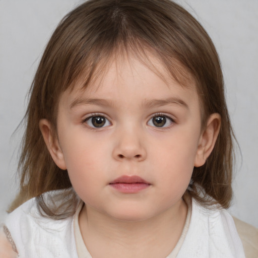 Neutral white child female with medium  brown hair and brown eyes