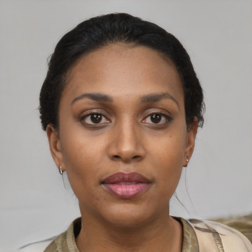 Neutral latino young-adult female with short  black hair and brown eyes