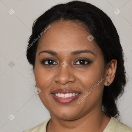 Joyful black young-adult female with medium  black hair and brown eyes