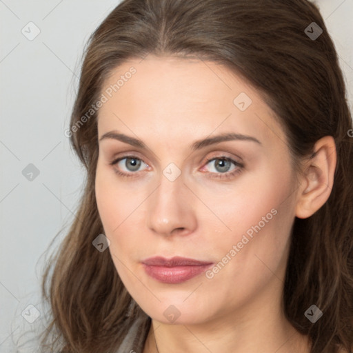 Neutral white young-adult female with long  brown hair and brown eyes