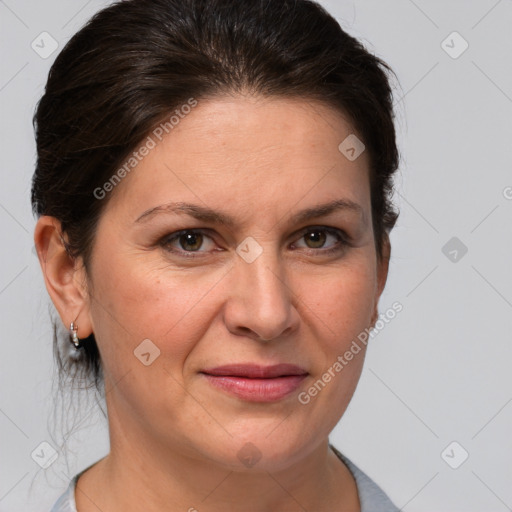 Joyful white adult female with short  brown hair and brown eyes