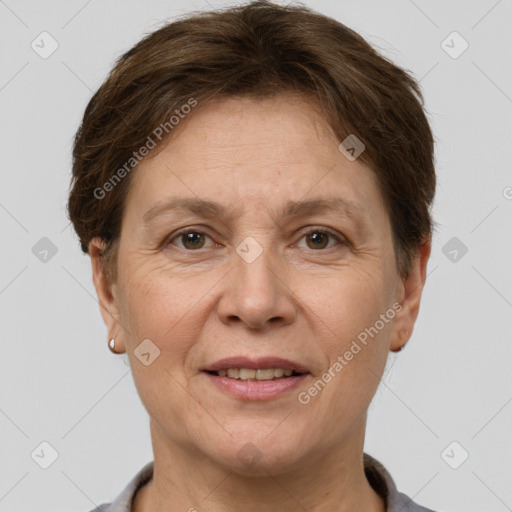 Joyful white adult female with short  brown hair and grey eyes