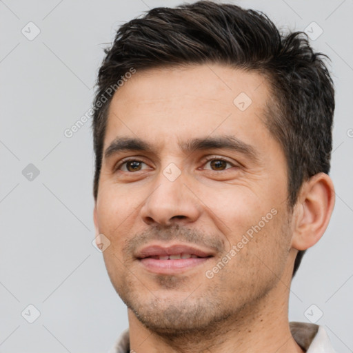 Joyful white adult male with short  brown hair and brown eyes