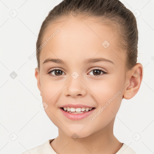 Joyful white child female with short  brown hair and brown eyes