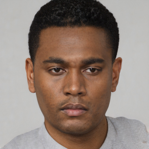 Neutral black young-adult male with short  black hair and brown eyes