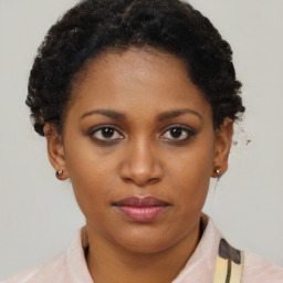 Neutral black young-adult female with short  brown hair and brown eyes