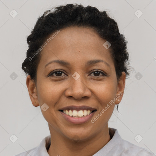 Joyful latino young-adult female with short  brown hair and brown eyes