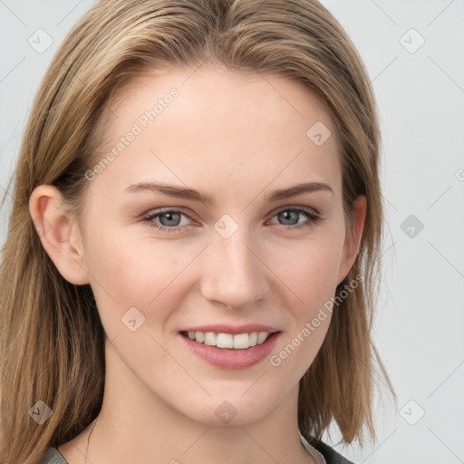 Joyful white young-adult female with long  brown hair and blue eyes