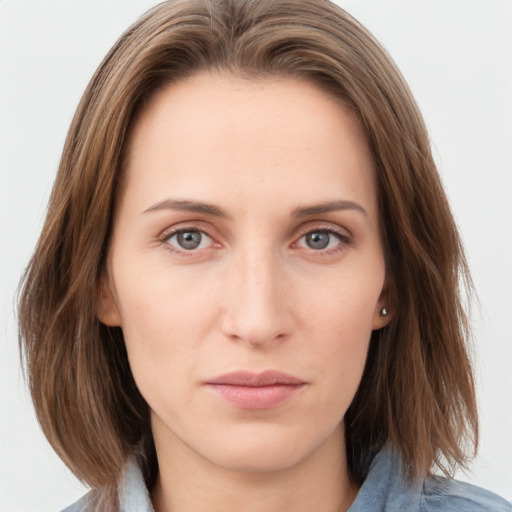 Neutral white young-adult female with medium  brown hair and grey eyes