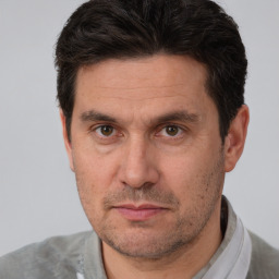 Neutral white adult male with short  brown hair and brown eyes