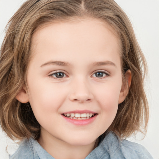 Joyful white child female with medium  brown hair and grey eyes