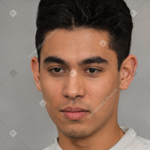 Neutral latino young-adult male with short  black hair and brown eyes