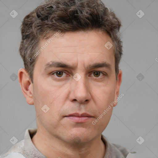 Neutral white adult male with short  brown hair and brown eyes