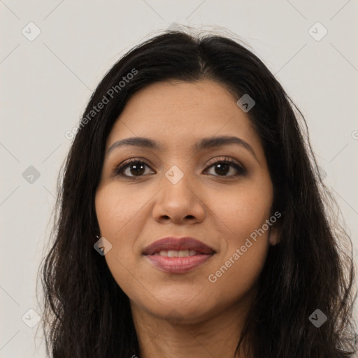 Joyful latino young-adult female with long  brown hair and brown eyes