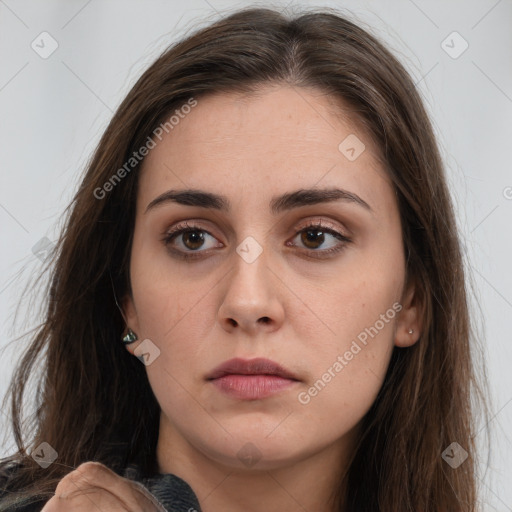 Neutral white young-adult female with long  brown hair and brown eyes