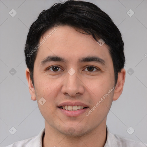 Joyful asian young-adult male with short  black hair and brown eyes