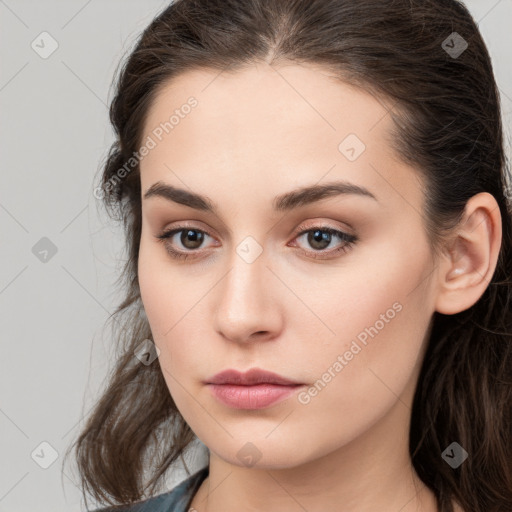 Neutral white young-adult female with long  brown hair and brown eyes