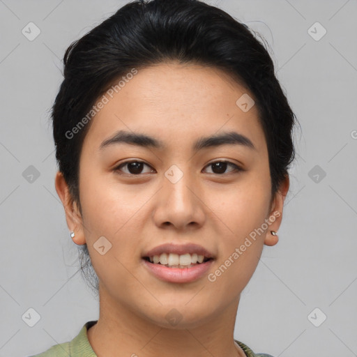 Joyful asian young-adult female with short  brown hair and brown eyes