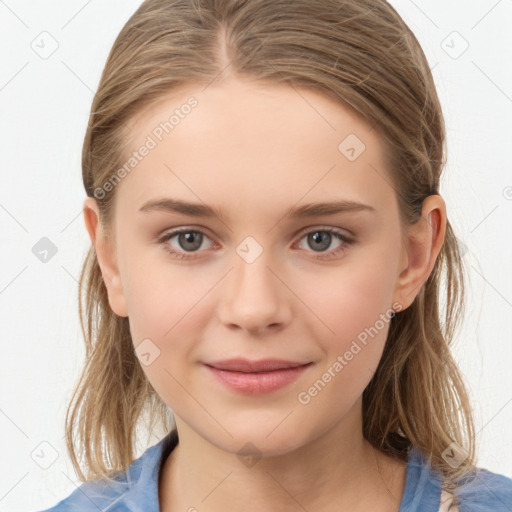 Joyful white child female with medium  brown hair and grey eyes