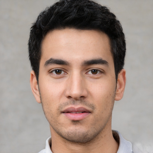 Neutral white young-adult male with short  black hair and brown eyes