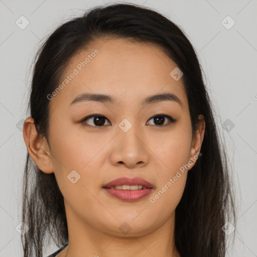 Joyful asian young-adult female with long  brown hair and brown eyes