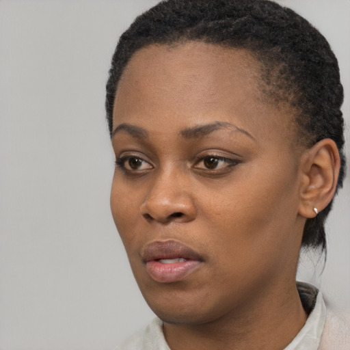 Neutral black young-adult female with short  black hair and brown eyes