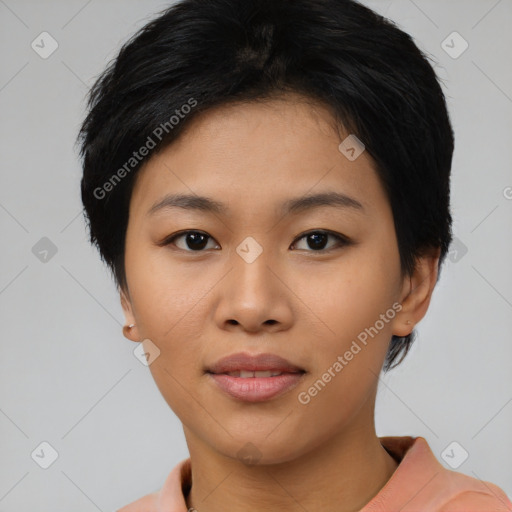 Joyful asian young-adult female with short  black hair and brown eyes