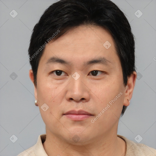 Neutral asian young-adult male with short  brown hair and brown eyes