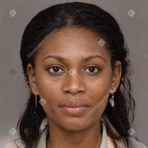 Joyful black young-adult female with medium  brown hair and brown eyes