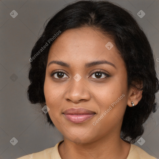 Joyful black young-adult female with medium  black hair and brown eyes