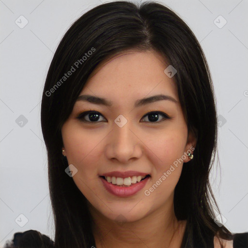 Joyful latino young-adult female with long  brown hair and brown eyes