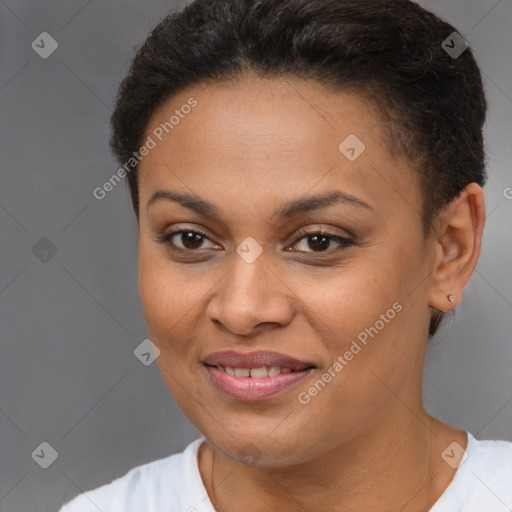 Joyful black young-adult female with short  brown hair and brown eyes