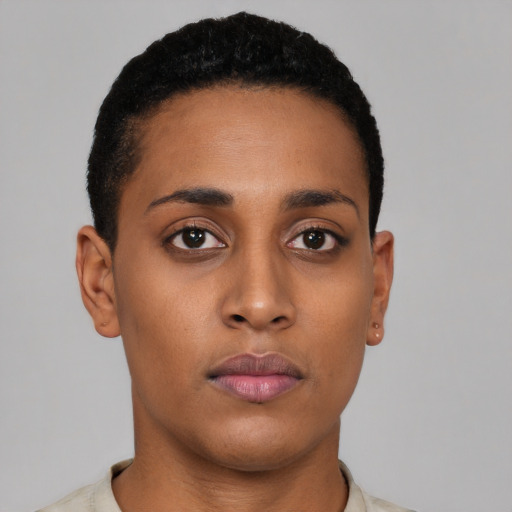 Neutral latino young-adult female with short  black hair and brown eyes