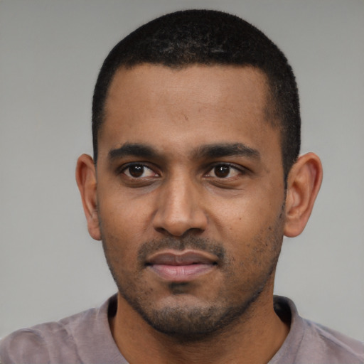 Neutral black young-adult male with short  black hair and brown eyes