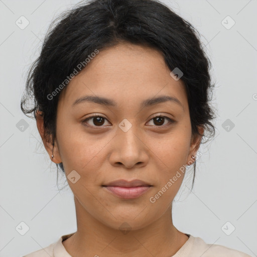 Joyful latino young-adult female with short  brown hair and brown eyes