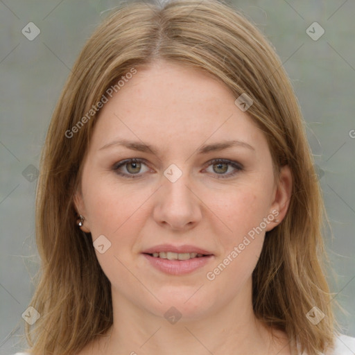 Joyful white young-adult female with medium  brown hair and green eyes