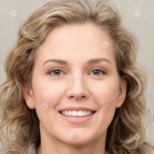 Joyful white young-adult female with medium  brown hair and green eyes