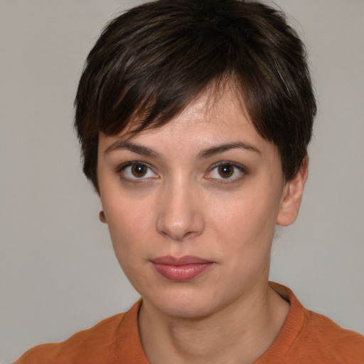 Neutral white young-adult female with short  brown hair and brown eyes