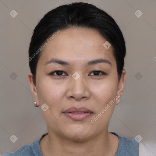 Joyful asian young-adult female with short  black hair and brown eyes