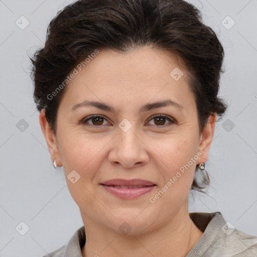 Joyful white adult female with short  brown hair and brown eyes