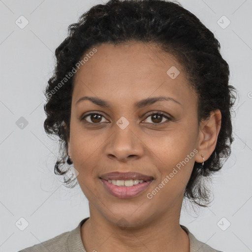 Joyful latino young-adult female with short  brown hair and brown eyes