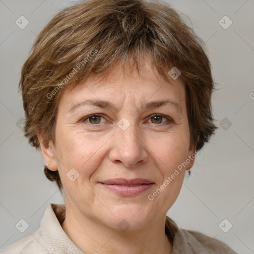 Joyful white adult female with medium  brown hair and grey eyes