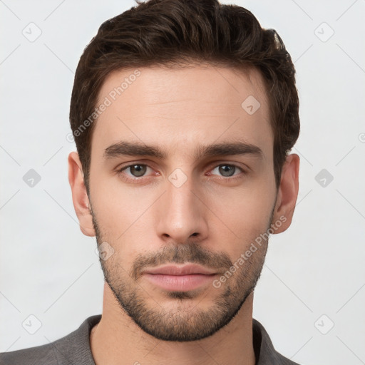 Neutral white young-adult male with short  brown hair and brown eyes