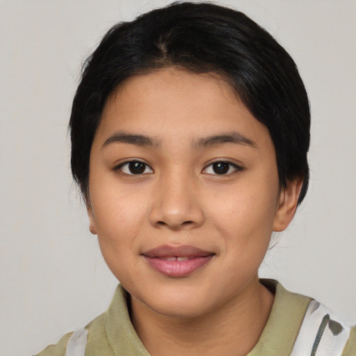 Joyful asian young-adult female with medium  black hair and brown eyes