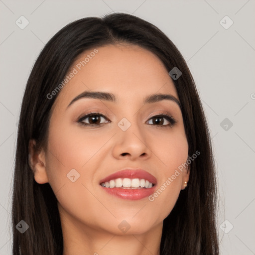 Joyful white young-adult female with long  black hair and brown eyes