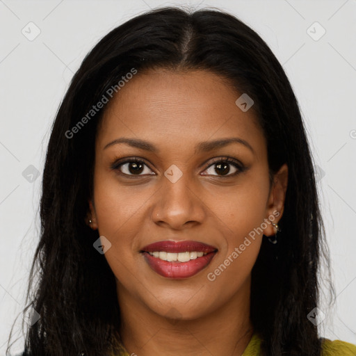 Joyful black young-adult female with long  brown hair and brown eyes