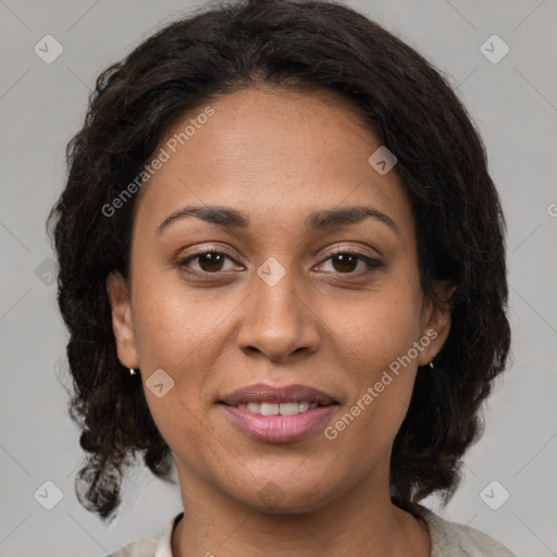 Joyful latino young-adult female with medium  brown hair and brown eyes