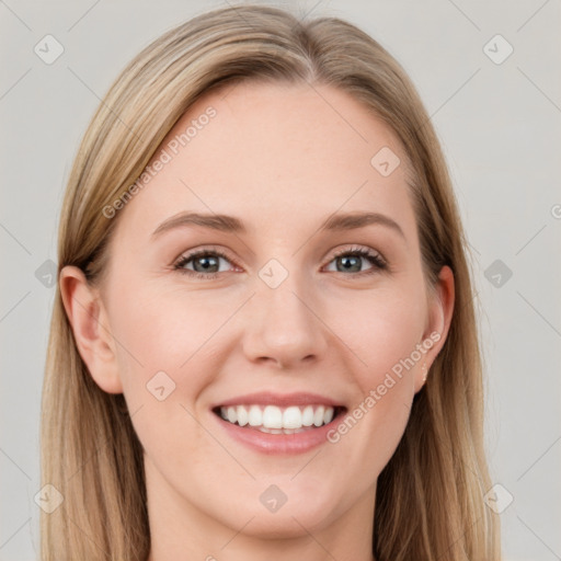 Joyful white young-adult female with long  brown hair and blue eyes