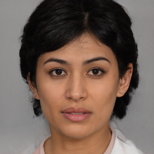 Neutral latino young-adult female with medium  black hair and brown eyes